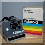 E13. Polaroid camera. 